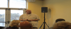 Carl Willis teaching leadership and marketing principles to an audience