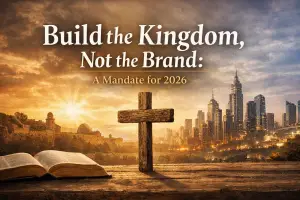 Wooden cross standing between an ancient city and a modern skyline at sunrise, with an open Bible in the foreground and the text “Build the Kingdom, Not the Brand: A Mandate for 2026” overlaid.